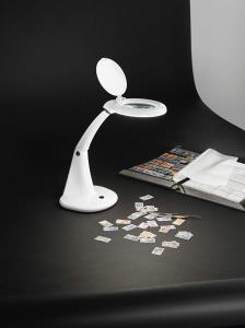 Table lamp with magnifying glass